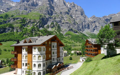 Leukerbad 450: Sky, Plant, Building, Mountain, Property, Nature, Green, Natural Landscape, Land Lot, House