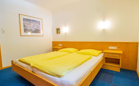 Längenfeld 165: Bedroom, Bed, Bed Frame, Bed Sheet, Bedding, Hardwood, Hotel, Mattress, Wood Stain, Mattress Pad