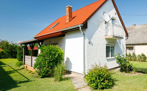 Pergola: Plant, Sky, Building, Property, Window, House, Land Lot, Door, Cottage, Grass
