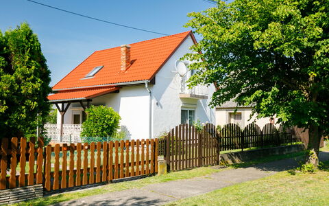 Pergola: Sky, Plant, Property, Fence, Tree, Building, Vegetation, Land Lot, Cottage, Natural Landscape