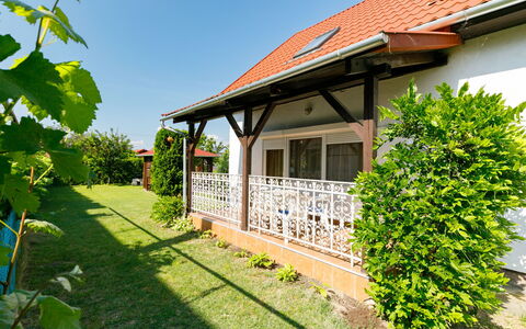 Pergola: Plant, Property, Sky, Building, Window, Green, Shade, Cottage, Land Lot, Grass
