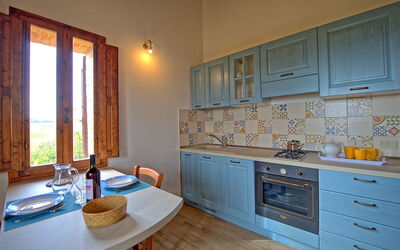 San Donnino 3: Countertop, Room, Property, Kitchen, Cabinetry, Furniture, Building, Interior Design, House, Yellow
