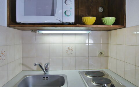 Les Chamois: Property, Tile, Sink, Room, Countertop, Bathroom Sink, Wall, Tap, Furniture, Cabinetry