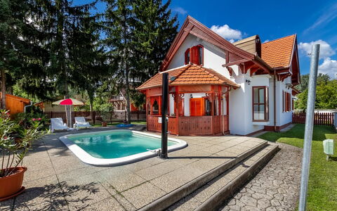 Ruby 1: Sky, Plant, Building, Cloud, Water, Tree, Swimming Pool, House, Shade, Wood