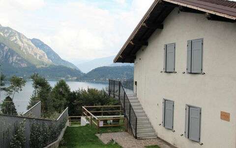 Lago di Ledro 350: Cloud, Sky, Water, Building, Window, Plant, Mountain, House, Wood, Grass