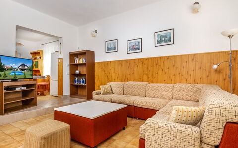 Grand Jardin: Furniture, Picture Frame, Cabinetry, Interior Design, Lighting, Shelf, Living Room, Wood, Comfort, Flooring