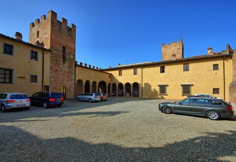 Certaldo: Town, Blue, Property, Building, Vehicle, Car, Luxury Vehicle, Wall, Architecture, Human Settlement