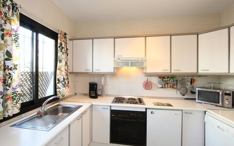 Villa Cielo: Sink, Cabinetry, Kitchen Sink, Property, Countertop, Window, Kitchen Stove, Kitchen, Lighting, Home Appliance