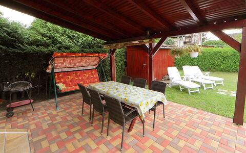 Hibiscus: Furniture, Property, Plant, Table, Building, Chair, Shade, Wood, Outdoor Furniture, Interior Design