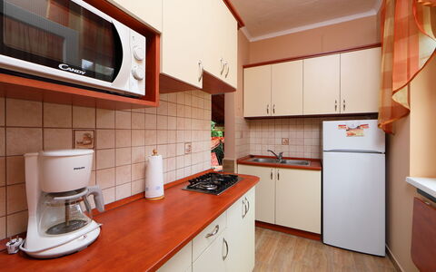 Hibiscus: Countertop, Cabinetry, Furniture, Property, Kitchen Appliance, Kitchen Stove, Kitchen, Building, Home Appliance, Wood