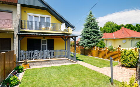 Hibiscus: Plant, Sky, Property, Building, Window, House, Land Lot, Tree, Grass, Neighbourhood