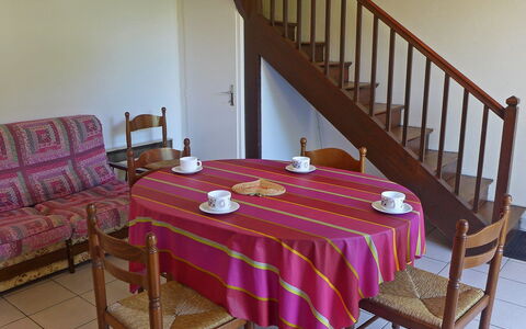 Jean Michel: Furniture, Room, Tablecloth, Property, Table, Pink, Dining Room, Chair, House, Textile
