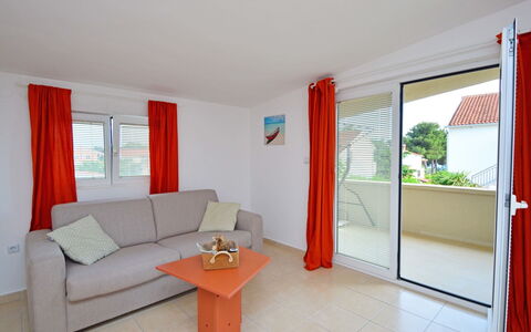 Vodice Jadrija 534: Couch, Window, Wood, Comfort, Interior Design, Orange, Building, Floor, Flooring