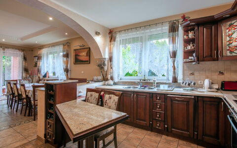 Villa Bieszkowice: Furniture, Sink, Cabinetry, Tap, Kitchen Sink, Countertop, Table, Plumbing Fixture, Kitchen, Wood