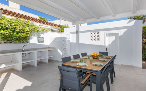 Vilafortuny: Table, Plant, Furniture, Property, Building, Interior Design, Floor, Shade, House, Outdoor Furniture