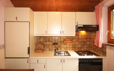 Hussl: Cabinetry, Kitchen Sink, Countertop, Property, Sink, Kitchen Appliance, Kitchen, Kitchen Stove, Building, Home Appliance