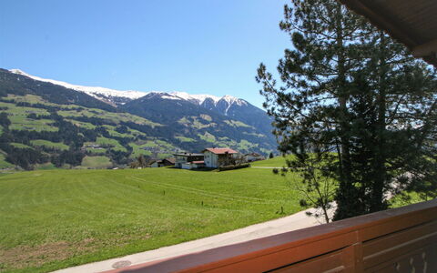 Hussl: Sky, Property, Mountain, Plant, Tree, Building, Slope, House, Wood, Grass