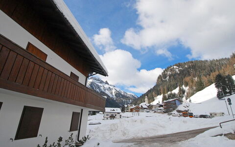 Canazei 700: Cloud, Sky, Building, Property, Snow, Mountain, Slope, Window, House, Tree