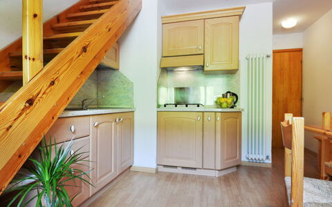 Canazei 700: Cabinetry, Furniture, Building, Countertop, Plant, Wood, Interior Design, Flooring, Floor, Wood Stain