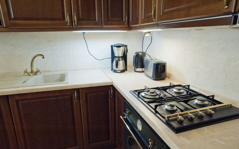 Rynek Starego Miasta: Kitchen, Kitchen Appliance, Major Appliance, Kitchen Stove, Wood, Gas Stove, Countertop, Stove, Cooktop, Cabinetry