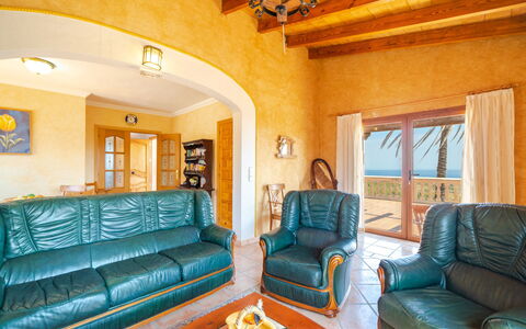 Cala Torta Na Lluny: Couch, Furniture, Property, Picture Frame, Table, Azure, Interior Design, Lighting, Living Room, Floor
