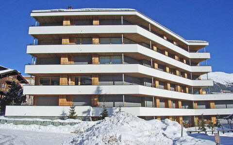 Promenade Wohnung 21: Building, Sky, Property, Snow, Window, Urban Design, Tree, Condominium, Tower Block, Real Estate