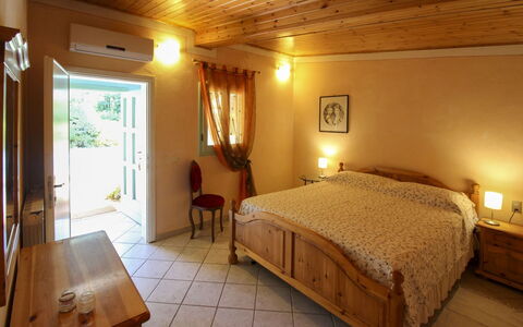 Pagliazzone: Furniture, Ceiling, Flooring, Interior Design, Floor, Bed, Room, Chair, Bedroom, Resort