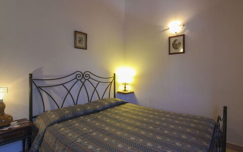 Il Viaggiolo: Bed, Bedroom, Bed Sheet, Interior Design, Bedding, Room, Floor, Linens, Flooring, Bed Frame