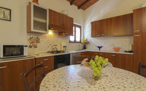 Il Viaggiolo: Kitchen, Furniture, Countertop, Interior Design, Wood, Flooring, Kitchen Appliance, Cabinetry, Floor, Lighting
