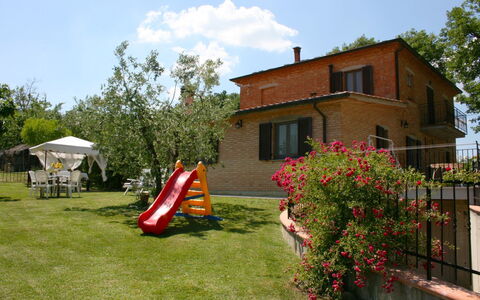 Podere San Bono: Plant, Sky, Flower, Building, Property, Window, Cloud, Tent, House, Tree