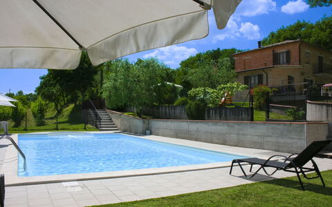 Podere San Bono: Swimming Pool, Resort, Leisure, Composite Material, Outdoor Furniture, Shade, Umbrella, Eco Hotel, Sunlounger, Landscaping