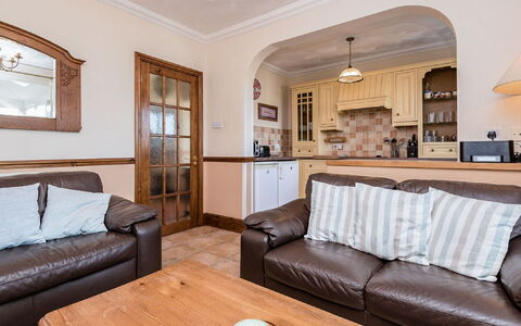 1 School Cottages: Brown, Table, Picture Frame, Furniture, Couch, Property, Comfort, Wood, Interior Design, Architecture