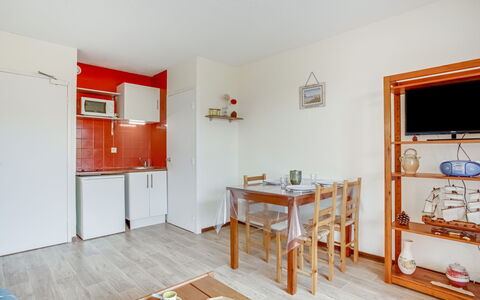 La Dune: Table, Property, Wood, Orange, Interior Design, Architecture, Flooring, Paint, Floor, Picture Frame