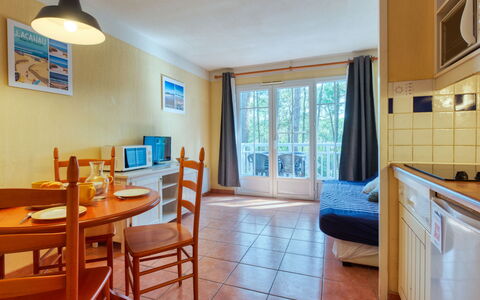 Domaine Golf Resort: Furniture, Table, Azure, Chair, Wood, Interior Design, Cabinetry, Flooring, Kitchen, Picture Frame