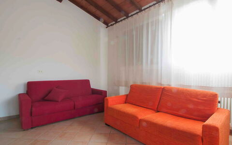 Bibbona 110: Furniture, Room, Property, Couch, Orange, Living Room, Interior Design, Floor, Building, Sofa Bed