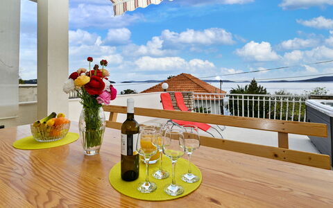 Tešija: Cloud, Building, Property, Furniture, Sky, Table, Tableware, Bottle, Wood, Interior Design