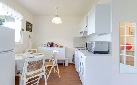 Les Corniches du Mont Canisy: Furniture, Cabinetry, Property, Table, Countertop, Wood, Chair, Building, Kitchen