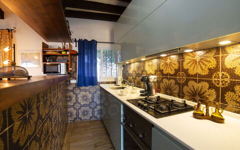 Vista Ifach: Cabinetry, Countertop, Property, Kitchen, Wood, Interior Design, Floor, Flooring, Drawer, House