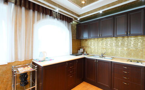 Villa Rosso: Cabinetry, Countertop, Furniture, Property, Building, Drawer, Chest Of Drawers, Wood, Kitchen, Sink