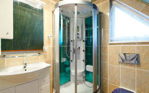 Villa Rosso: Mirror, Tap, Plumbing Fixture, Sink, Building, Cabinetry, Bathroom, Bathroom Sink, Bathroom Cabinet