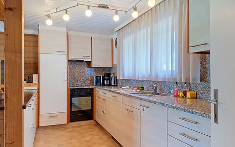 Chalet Almis 5: Kitchen, Countertop, Interior Design, Flooring, Kitchen Appliance, Cabinetry, Wood, Major Appliance, Ceiling, Floor