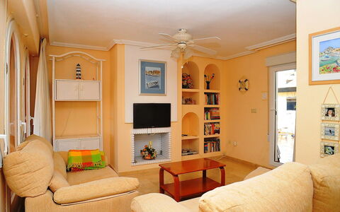 San Esteban: Room, Living Room, Property, Furniture, Interior Design, Building, Yellow, Ceiling, House, Wall