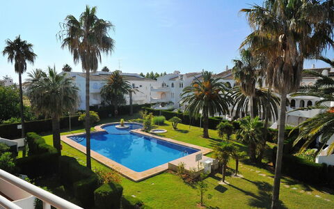 San Esteban: Water, Plant, Sky, Property, Swimming Pool, Azure, Tree, Building, Arecales, Condominium