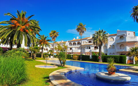 San Esteban: Plant, Sky, Building, Tree, Blue, Body Of Water, Arecales, Residential Area, Leisure, Urban Design