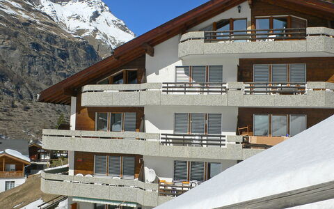 Alba: Sky, Building, Property, Window, Mountain, Snow, Slope, Tree, House, Biome