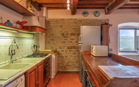 Villa Monteloro: Countertop, Room, Property, Furniture, Kitchen, Cabinetry, Building, Floor, Interior Design, Sink