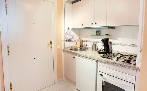 Turquesa Beach 03: Property, Room, Kitchen, Furniture, Building, Cabinetry, Real Estate, House, Interior Design, Major Appliance