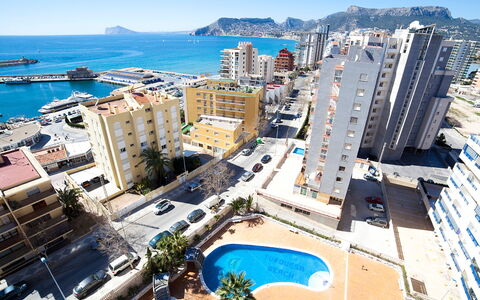 Turquesa Beach 03: Sky, Water, Building, Property, Blue, Azure, Window, Urban Design, Tree, Condominium