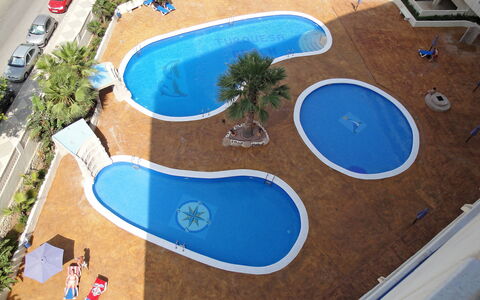 Turquesa Beach 03: Water, Plant, Property, Swimming Pool, Azure, Blue, Seaside Resort, Building, Urban Design, Tree