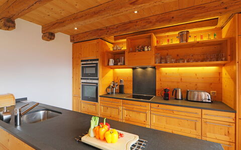Saint Piran: Countertop, Cabinetry, Property, Furniture, Kitchen, Wood, Interior Design, Orange, Lighting, Kitchen Stove